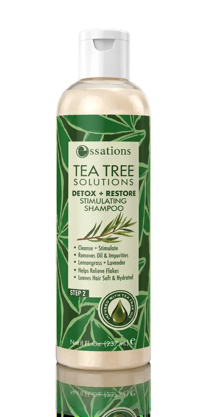 A bottle of Essations Tea Tree Solutions Detox + Restore Stimulating Shampoo, featuring a green and white label with tea tree leaf illustrations, set against a solid black background with a reflection below.